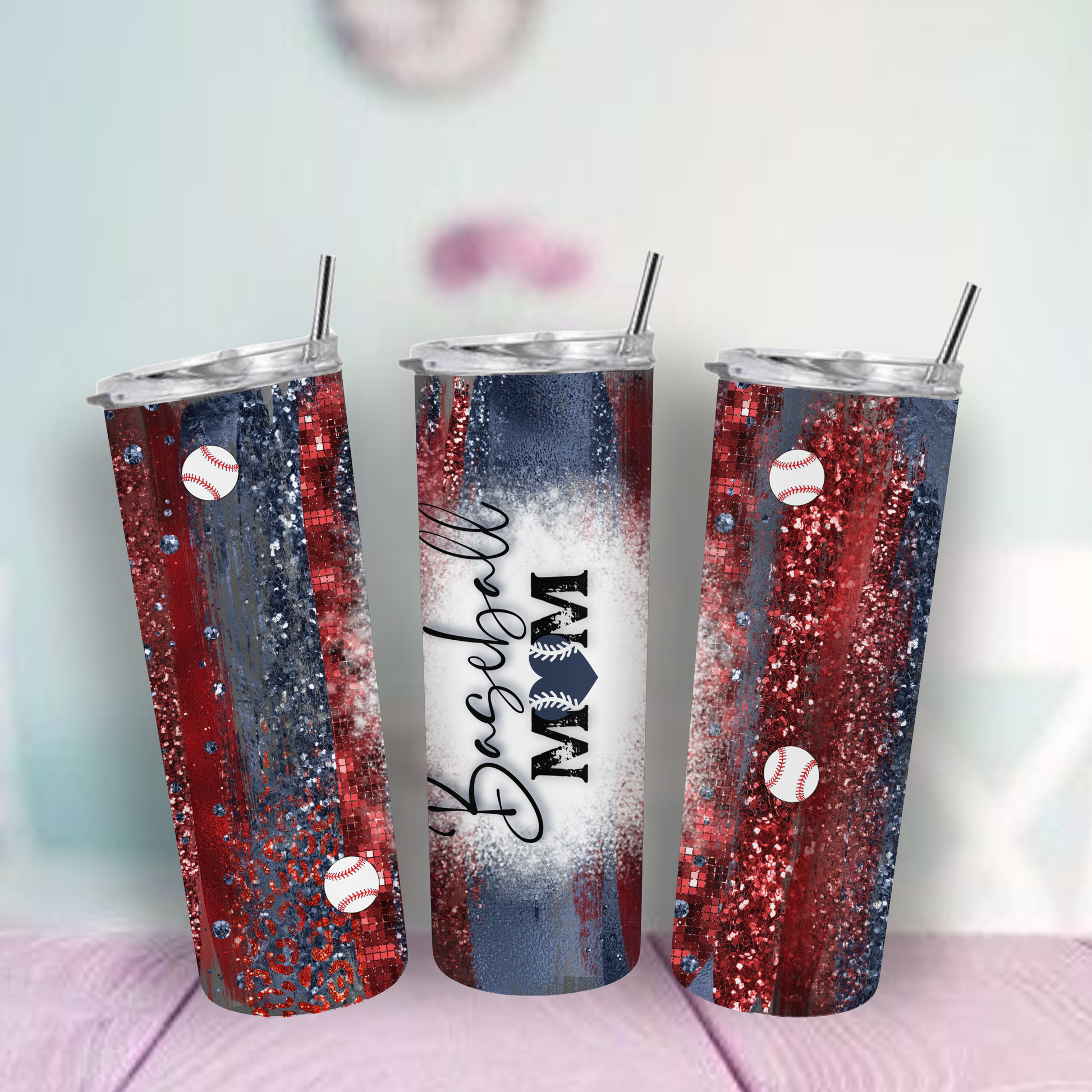 Three tumblers with baseball-themed designs on Red blue and glitter look.