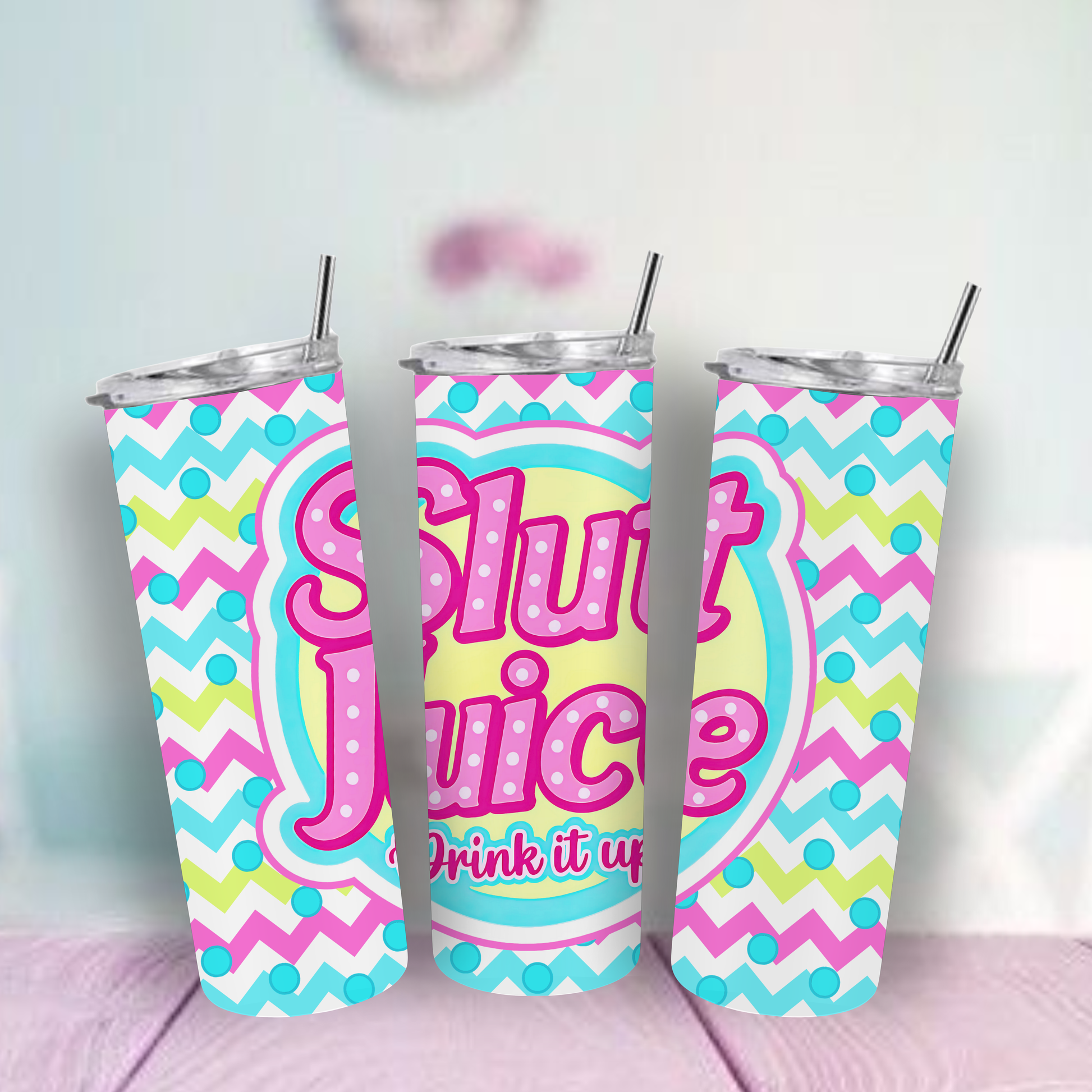 Colorful tumbler with 'Slut Juice' text.